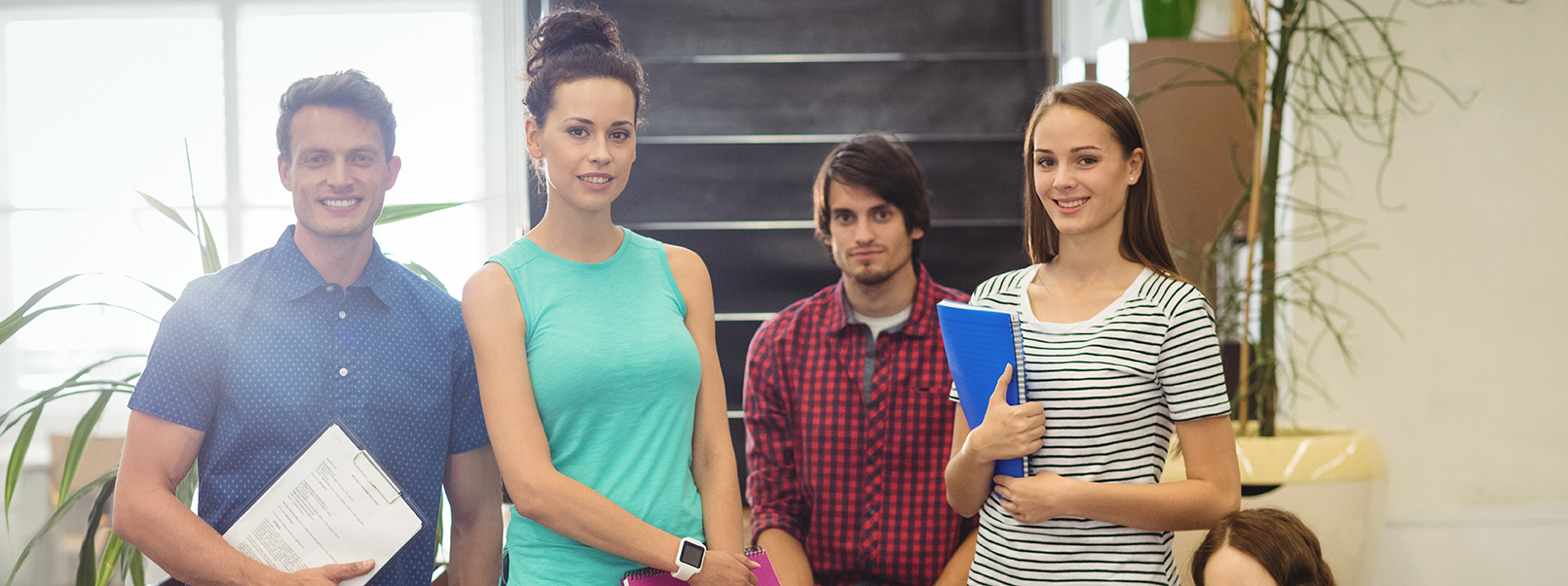 Business executives smiling in office